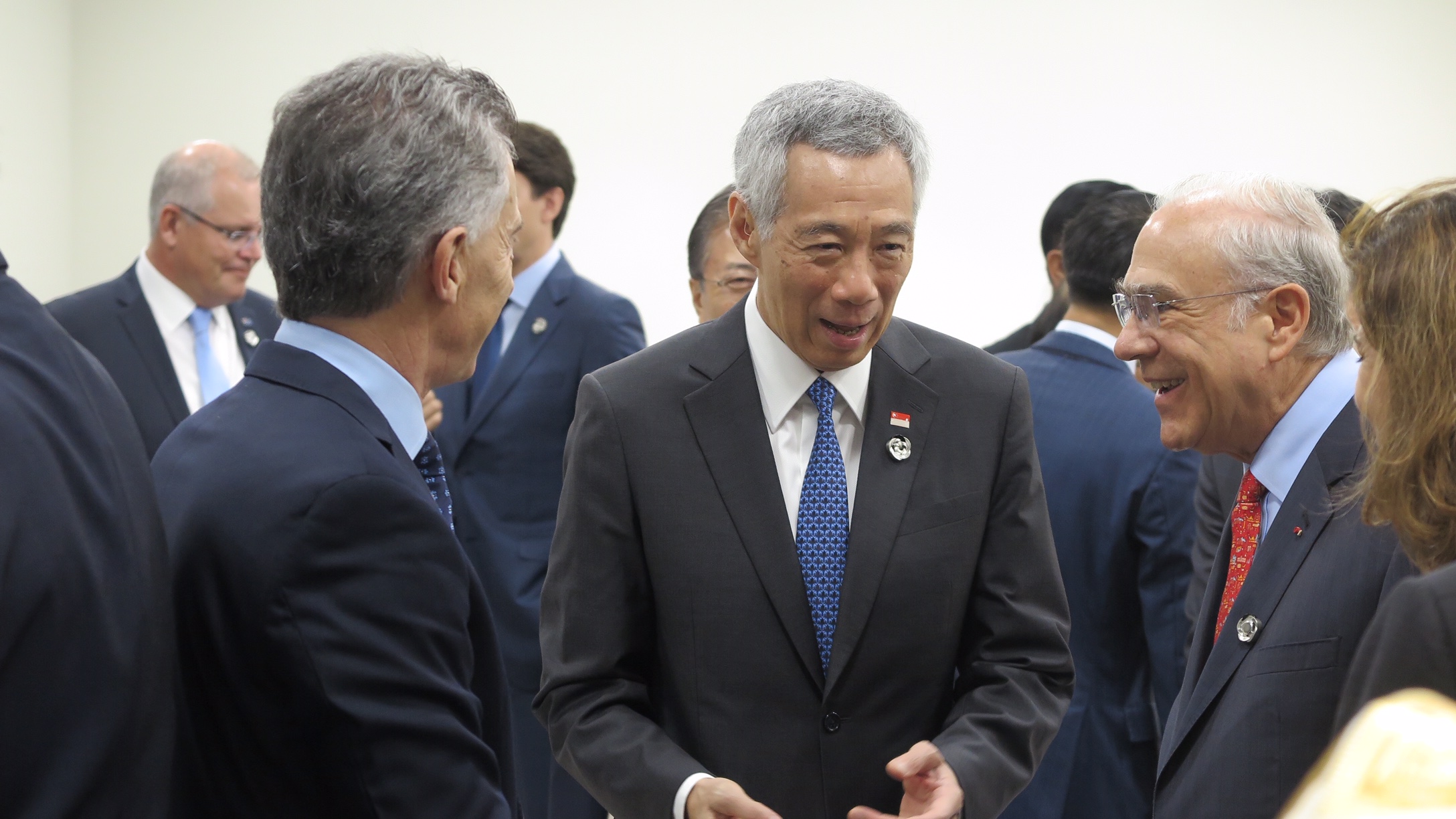 Macri con Lee Hsien Loong y Ángel Gurría